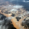 How does mining pollute the air?