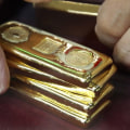 How do most people invest in gold?